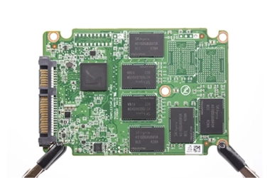 Image showing an ASUS SSD with its internal components exposed for data recovery purposes.