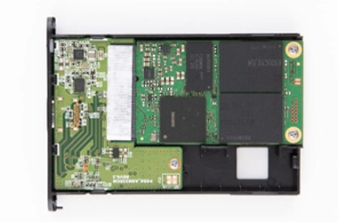 Image showing an SSD not appearing in a system's drive list, indicating potential connection issues or drive failure.