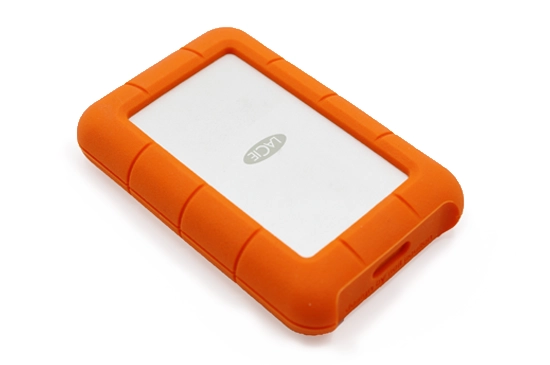 LaCie portable hard drive displayed on a desk, showing its compact design and connection port.