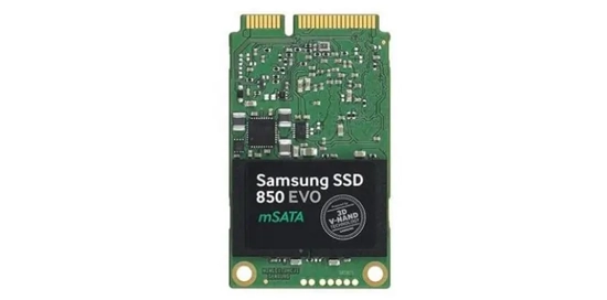 Samsung SSD 850 EVO mSATA drive displayed on a workbench, showcasing its compact size and connections.